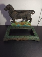 Ancien objet de décoration en fonte motif chien
