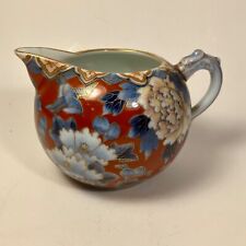 Fukugawa Seiji. Petit pot en porcelaine à décor polychrome de fleurs. Début XXèm