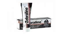 Zebraline crème décor pâte noir métaux fonte poêle chauffage cuisinière ZEBRA