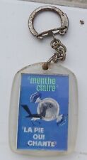 porte clé la pie qui chante ,bonbon menthe claire 