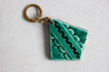 Ancien Porte-clef SINGER Concours panoramic 1966 céramique (41568)