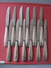 ++"525.7"    12 COUTEAUX DE