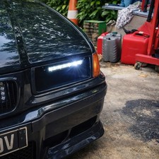 Écopes de phare dynamique BMW