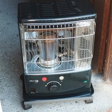 POELE A PETROLE SUR PLAQUE EN