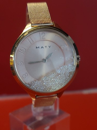 Montre femme doré - , et