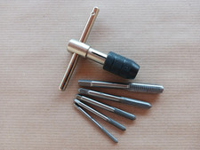 Tourne a gauche porte tarauds