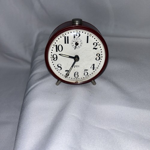 Ancien réveil métal rouge