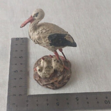 Ancienne figurine, cigogne et