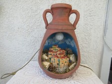Très belle jarre en terre cuite ayant à l'intérieur en village miniature