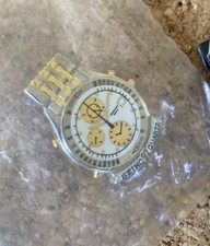 PIN'S  MONTRES  /  SEIKO QUARTZ  /  ARTHUS BERTRAND  / Neuf Sous Blister