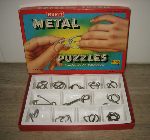 Ancien jeu casse tête metal - tête,