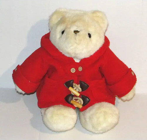 Peluche ours manteau rouge