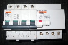 DISJONCTEUR DIFFERENTIEL 4P. TETRAPOLAIRE 32A 30mA COURBE C MERLIN GERIN PC.20KA