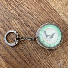 Porte clés pie qui - la,