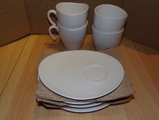Lot de 4 tasses et 4 soucoupes porcelaine " l'inédit "