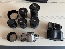 appareil photo reflex argentique canon + 5 zoom canon et sigma + flash