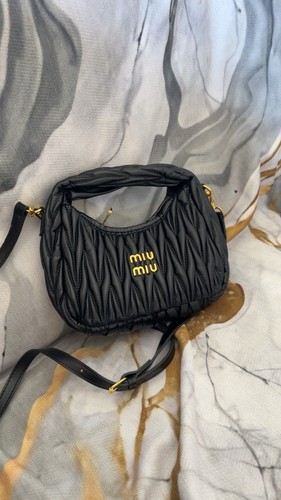 Sac main miu - main,