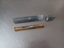 Petit niveau à bulle laiton dans son étui Ancien