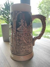 Chope à bière vintage émail