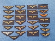 Lot de 26 insignes de poitrine