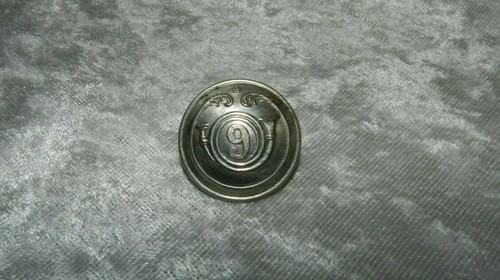 Ancien bouton militaire argent