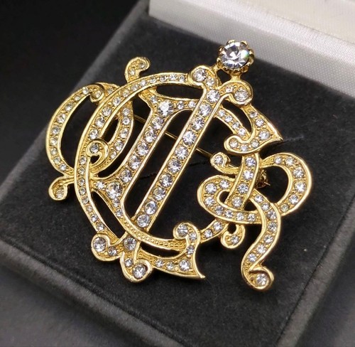 Broche christian dior emblème - christian,