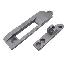 Plaque à aiguille de reliure