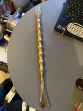 chausse pied gratte dos main