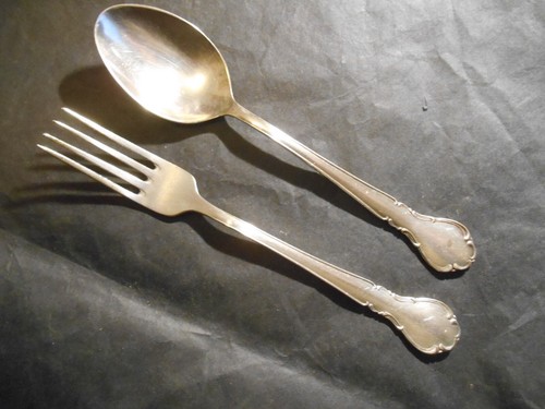 Paire couverts en - de,