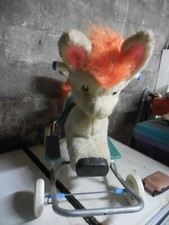 Ancien cheval à bascule et à roulettes vintage