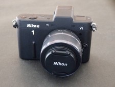 Boîtier Nikon 1, objectif
