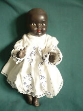 Poupon baigneur noir Moulin, 