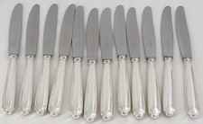 Ravinet d'Enfert Club, 12 couteaux de table, métal argenté, excellent état.