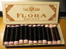 BOBINES  CORDONNET de SOIE marque "FLORA" Lot de 12 (9 NOIRES + 3 BRUNS variés)