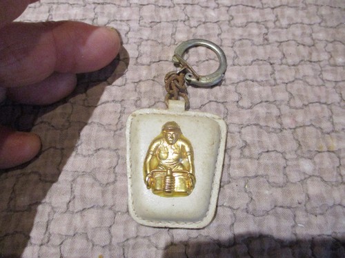Ancien porte clé coureur - au,