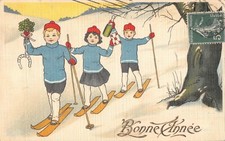 CPA FANTAISIE / BONNE ANNEE / ILLUSTRATEUR / ENFANTS A SKI / SPORTS D'HIVER