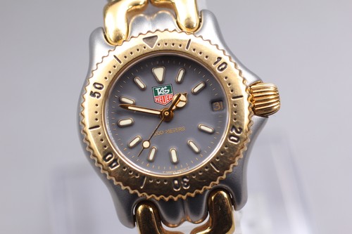 Presque comme neuf tag heuer - comme, neuf]
