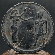 Ancienne sculpture disque bi