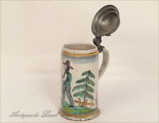 Pichet en faïence de Nevers personnage 19e