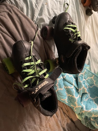 Black skates with purple - black, and