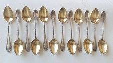 12 Cuilleres à moka argent massif et vermeil