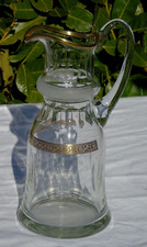 Moser  Broc à eau en cristal taillé et rehaussé d'or Haut 29,5 cm