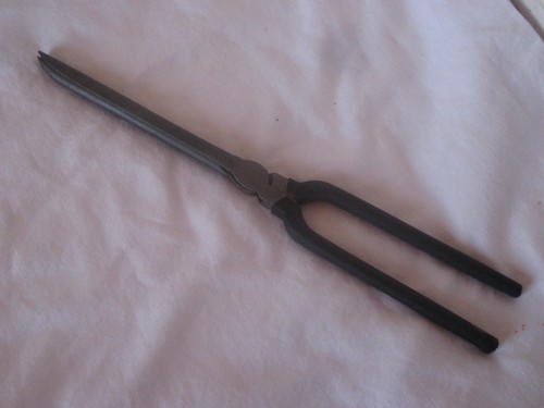 Ancien fer friser les - à,