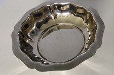 Plat rond en inox massif Guy