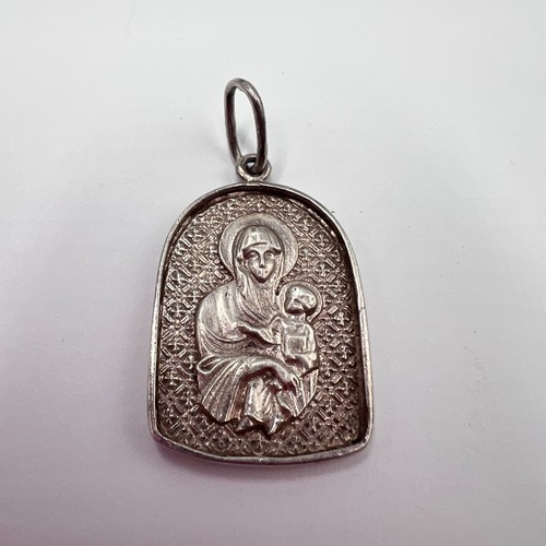 Ancien pendentif religieux
