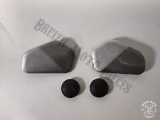 Caches latéraux de cadre