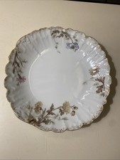 bel ancien plat en porcelaine