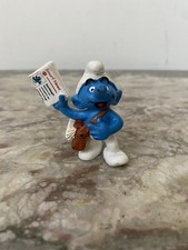 Schtroumpf vendeur journaux - de,