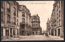 CPA Reims, Rue du Cadran-St-Pierre avec bâtiments historiques et calèche 