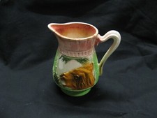 Ancien pichet en barbotine